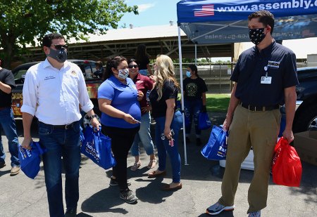 Assemblyman Rudy Salas and a group of volunteers on Friday (May 29) handed out over 400 bags of food to needy families at Hanford's Fraternal Hall. 